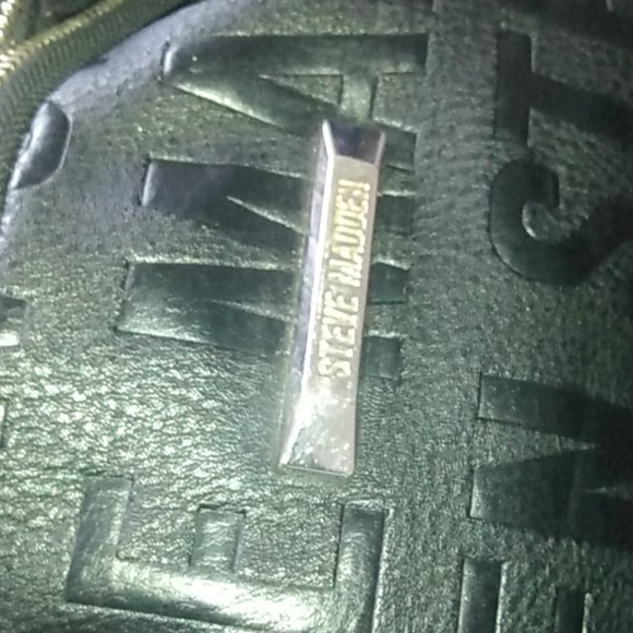 A Steve Madden bookbag ( the Zipper not zipping up